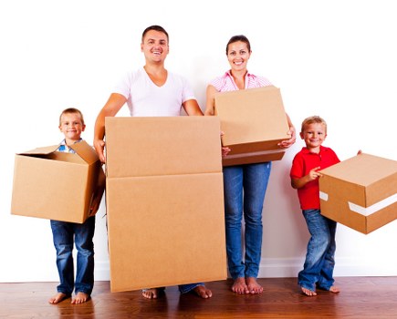 Office relocation planning in Teddington with moving boxes and workspace items