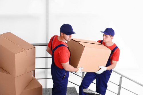 Removal van and crew serving a Teddington home move