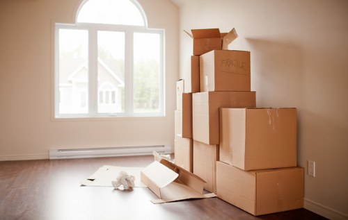 Professional office movers handling desks and equipment in a local relocation