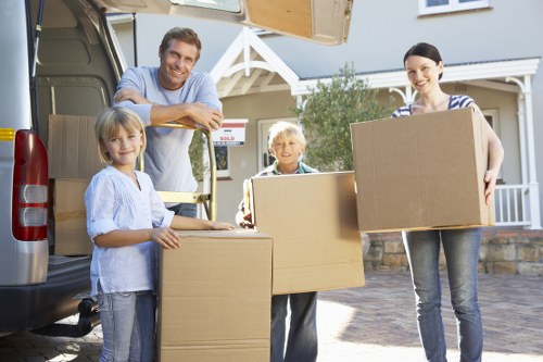 Packing and loading furniture into a moving truck in Teddington
