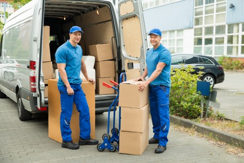 Office relocation equipment and boxes ready for transport in Teddington